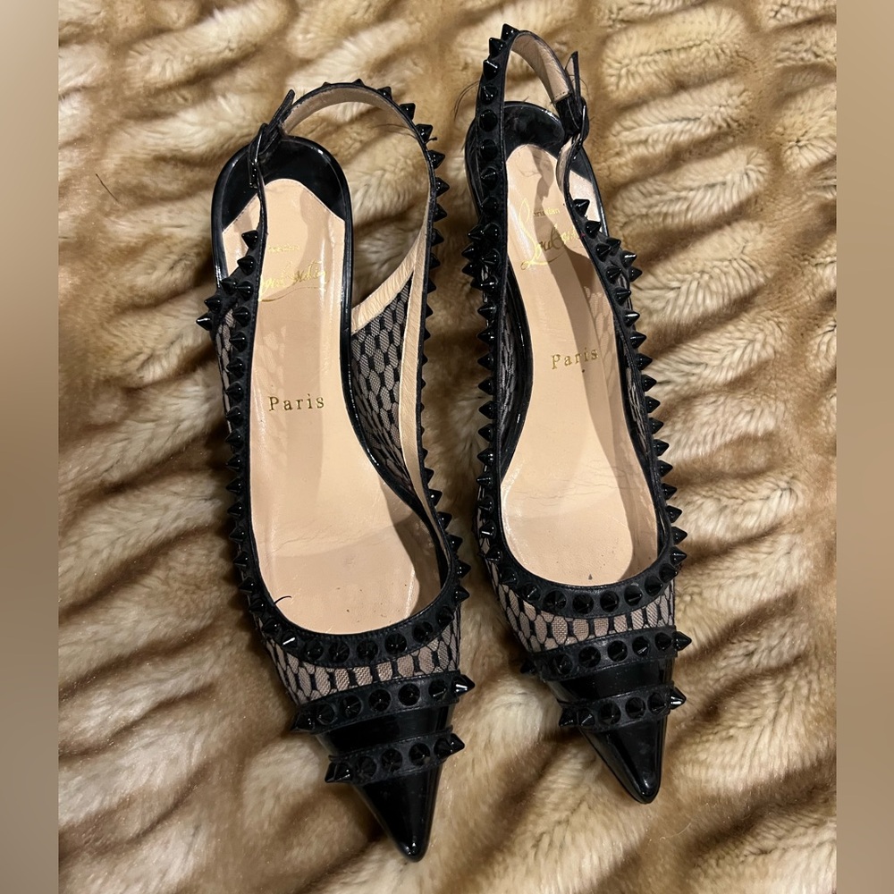 Christian Louboutin Manovra black fishnet studded kitten heels